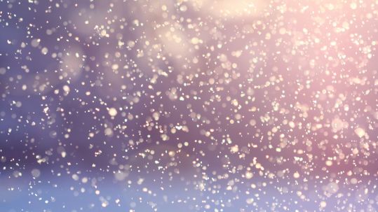 Image of the snow falling on a beautiful winter night