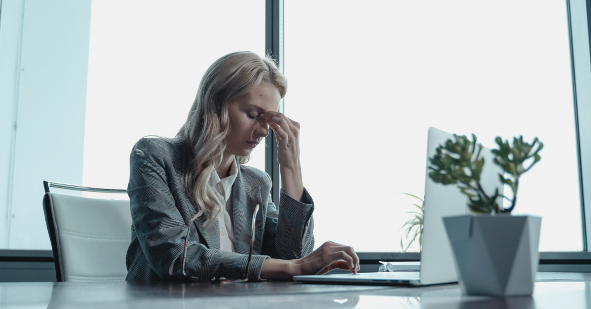 lady at work struggling with stress management