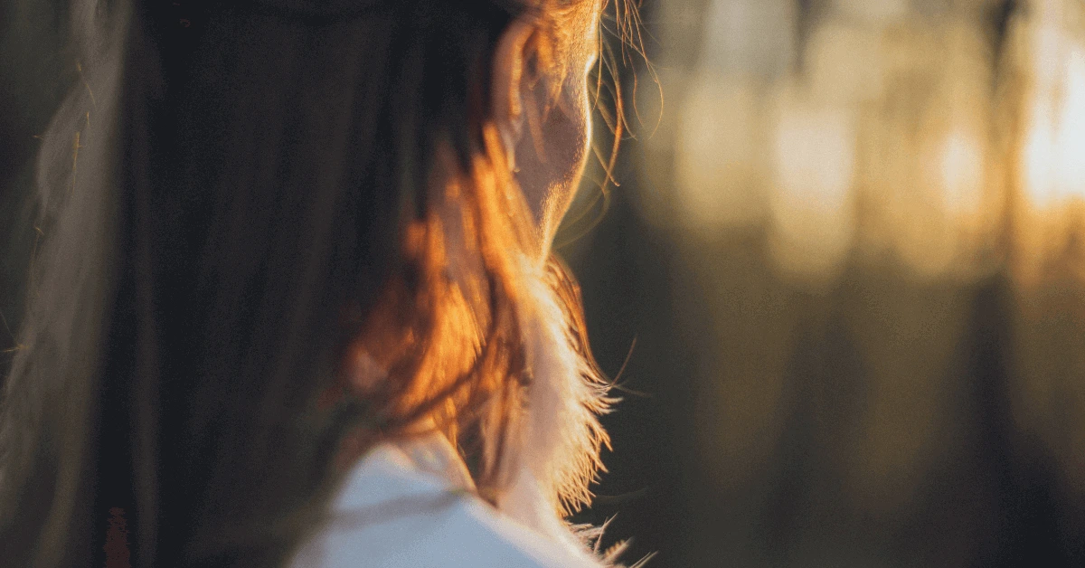 Adult woman looking ahead thoughtfully, representing planning and self-understanding in ADHD therapy Melbourne for adults, including neurodiverse and gender-inclusive care