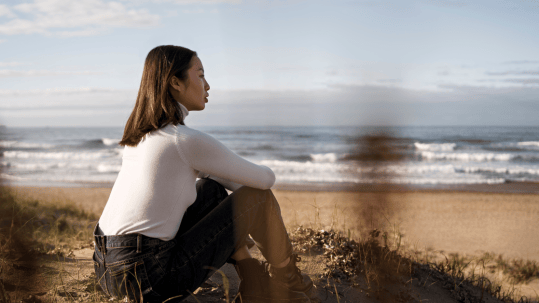 girl sit on beach